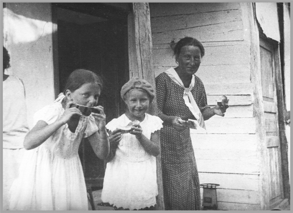 Marga (center) with her mother and an unidentified child